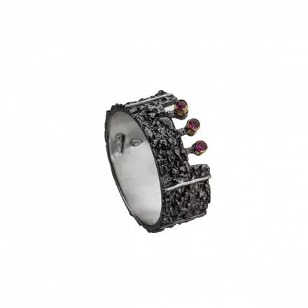 Darkened antique finish Silver Ring with three rubies on one side in 18k gold settings