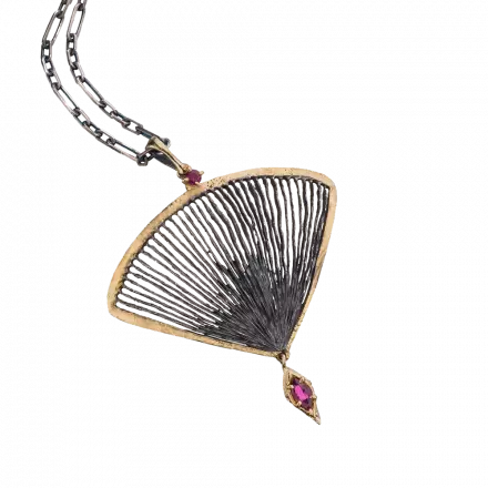Darkened antique finish Silver with 18k Gold and dangling Ruby at its edge