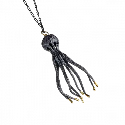 Silver Cuttlefish Pendant Necklace with 18k gold leaves and rubies at its extremities