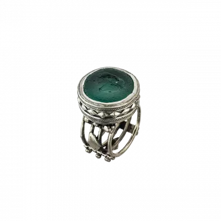 Wide Silver Ring mounted with raised Roman Glass wrapped with filigree decorations