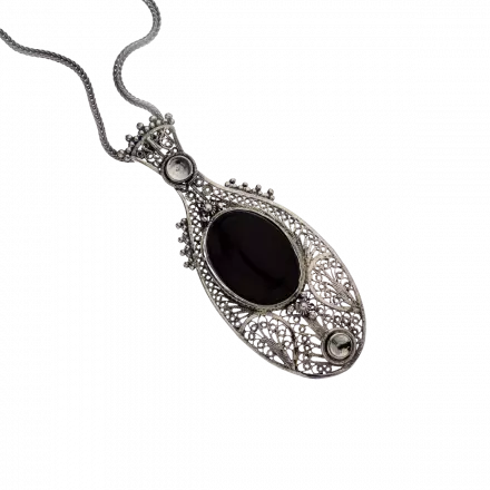 Silver Necklace with "fragrance canister" filigree pendant set with a Carnelian stone