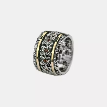 Silver Ring with center Garnet Flowers bordered with 9k Gold stripes
