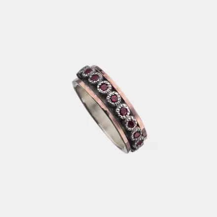 Silver Ring decorated all around with Silver Circles set with Garnets and bordered with 9k Gold