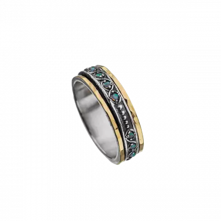 Silver Ring with decorative center rotating hoop set with Opals and bordered with 9k Gold