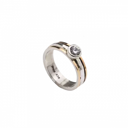 Silver Ring with hammered center rotating hoop set with Zircon and bordered with 9k Gold
