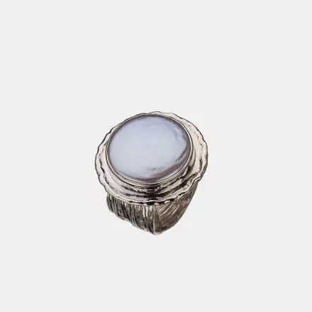Silver Ring with uniquely sized center Button Pearl