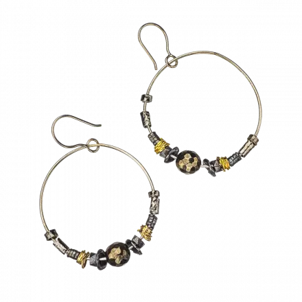 Dangling Silver Earrings with small silver tubes passing through a hoop