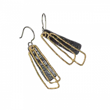 Dangling Silver Earrings with flattened, darkened silver trapezium and two gilded rectangles