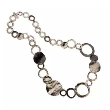 Silver Necklace composed of white, darkened and gilded silver circles