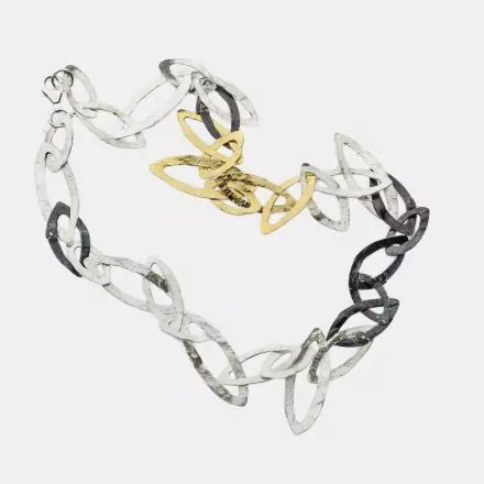 Long Necklace composed of gilded, white and darkened interlocking oval silver rings