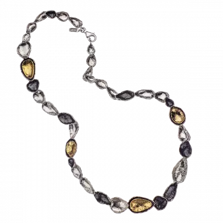 Silver Necklace composed of concave white silver, darkened silver and gilded links
