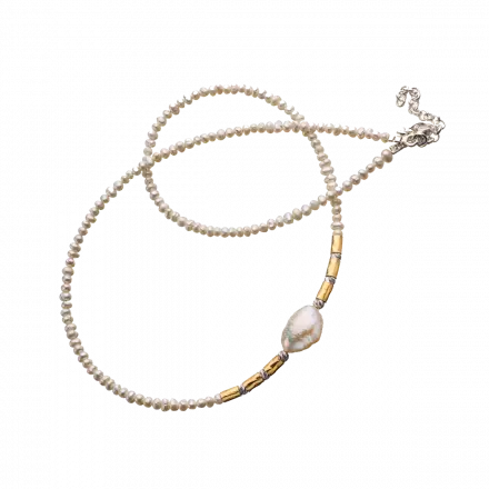 Dainty Necklace composed of pearls, small goldfilled tubes and a stunning large center pearl