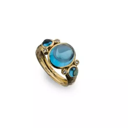 14k Gold Ring with center oval Swiss Blue Topaz flanked by Blue Topaz Stones and Diamonds 0.08ct
