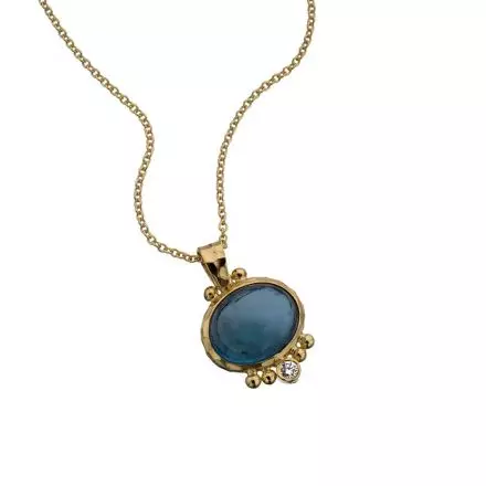 14k Gold Necklace with oval Pendant set with London Blue Topaz and lower down with a 0.03ct Diamond