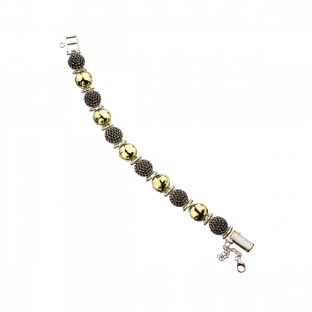 Silver Bracelet with 11 domes, 6 of them set with garnets and 5 of them wrapped in 9k gold