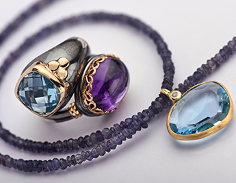 Exotic Elegance Collection | 925 Sterling Silver & 14K Gold Jewelry with Blue Topaz and Howlite