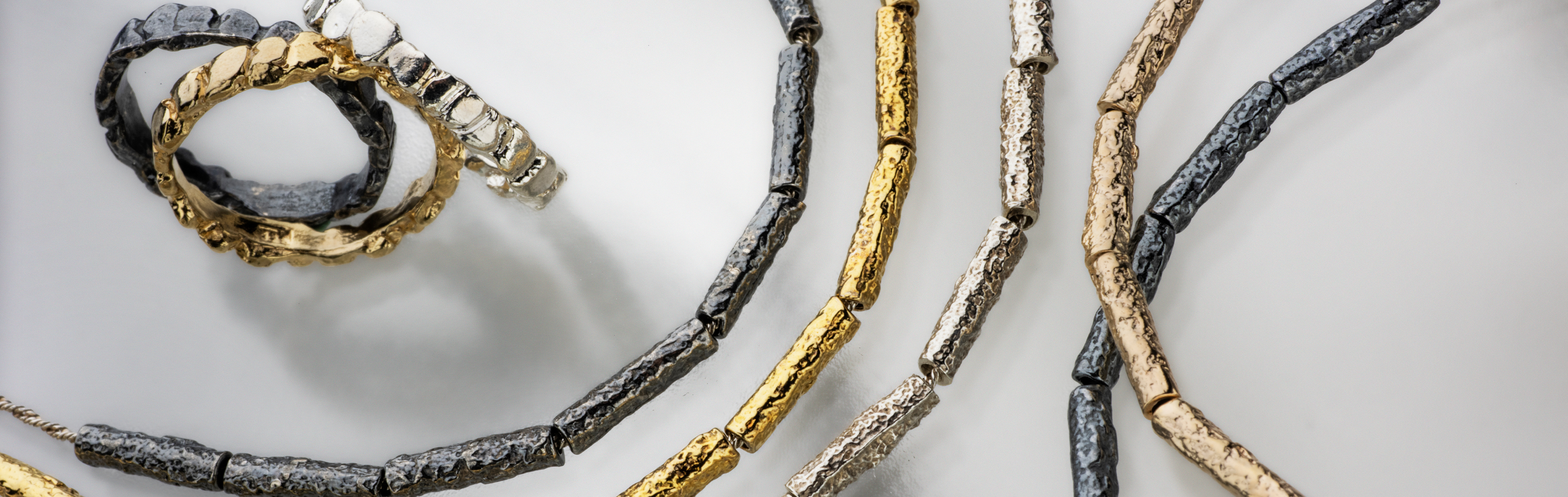 Spirals Collection | White, Oxidized & Gilded Silver Jewelry